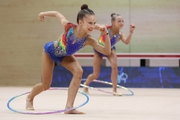 Gymnasts during an exercise with hoops