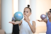 A gymnast during practice at the training camp in the Academy