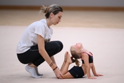 Academy coach Olga Frolova with a young gymnast during the Academy selection process