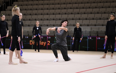 A fragment of the Academy group gymnasts training session with the Alina festival choreographer Irina Zenovka