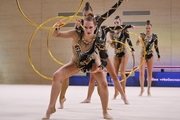 Gymnasts during an exercise with hoops