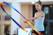 Gymnast from the Khanty-Mansiysk Autonomous Okrug during an exercise with a ribbon