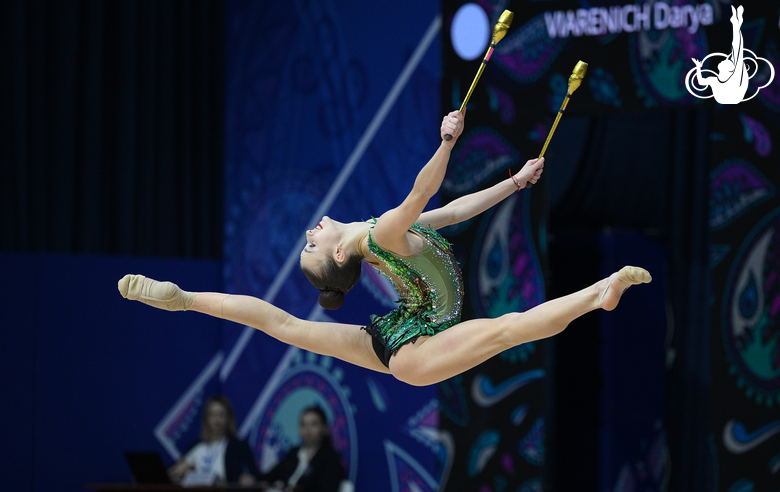 Daria Verenich during an exercise with clubs