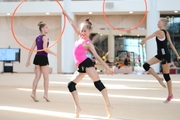 Gymnast performing an exercise with hoops