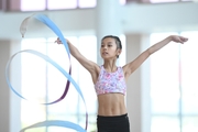 A gymnast from China during the ribbon exercise when training