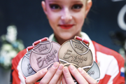 Gymnast with awards following the results of the EVGENIYA CUP tournament