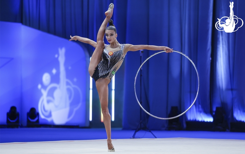 Arina Tkachuk during an exercise with a hoop