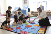 Young gymnasts during a class in the Academy classroom