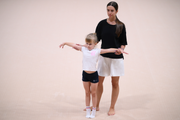 Academy coach Elizaveta Chernova with a young gymnast during the selection process