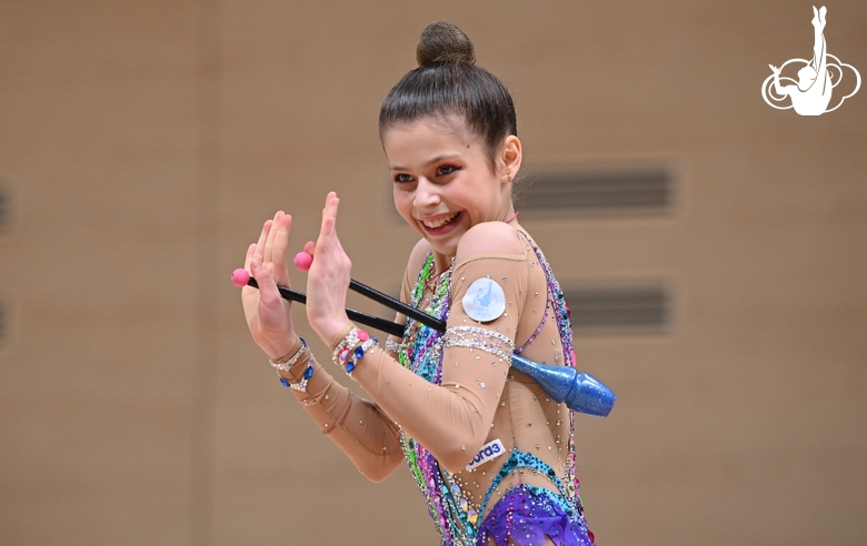 Karolina Tarasova during an exercise with clubs at a control training session