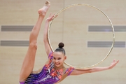 Gymnast during an exercise with a hoop