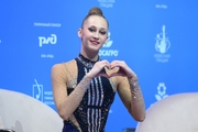 Alina Rechkina after an exercise with clubs