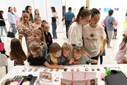 Guests of the Academy in the face painting area