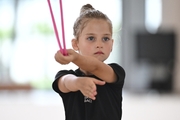 Young gymnast during training