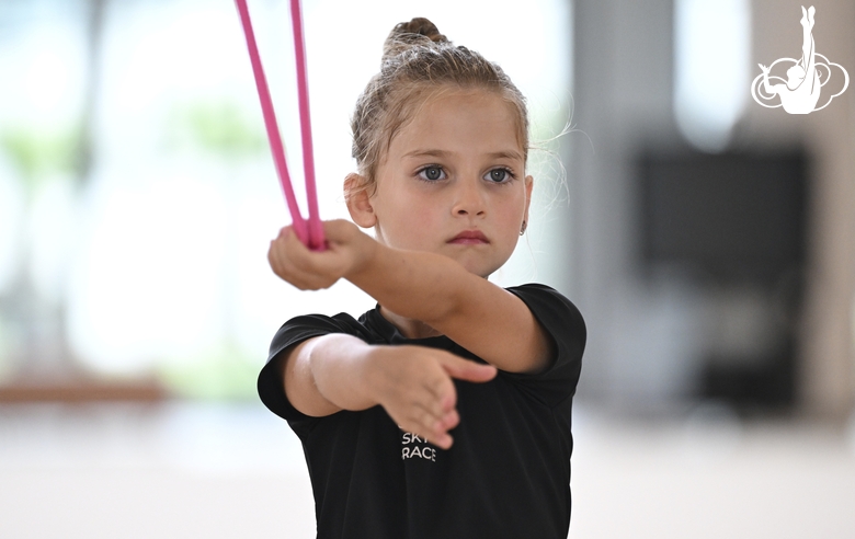 Young gymnast during training