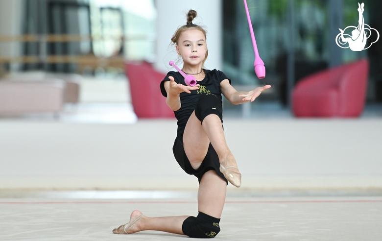 Elvira Belyaeva during an exercise with clubs