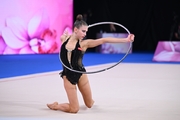 Ekaterina Sazonova during an exercise with a hoop