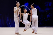 Gymnasts during an exercise with hoops