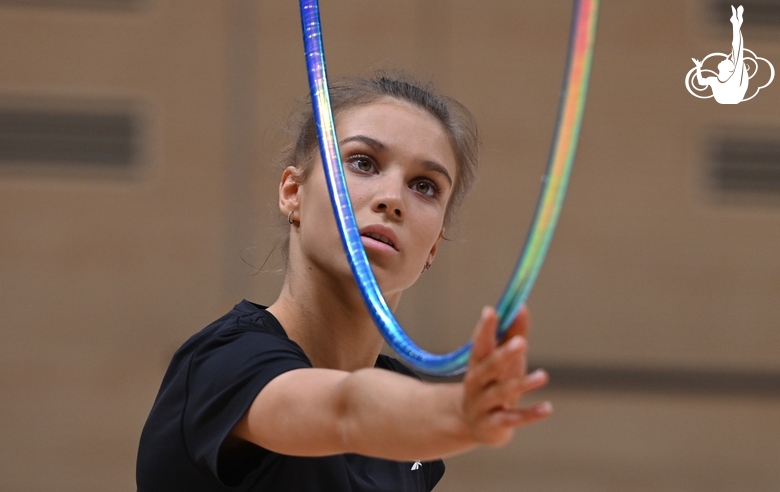 Gymnast during an exercise with a hoop during floor testing