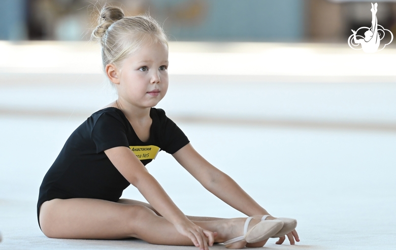 Young gymnast during training