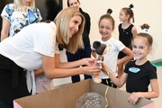 Young gymnasts in the Academy's classroom