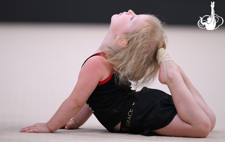 Young gymnast during training