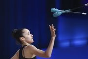 Isabella Rojas during an exercise with clubs at floor testing