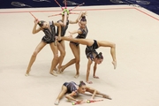 Gymnast during an exercise with clubs