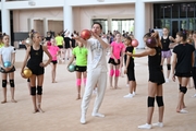 Choreographer Alexander Buklov with gymnasts from the Amur Tiger society during training