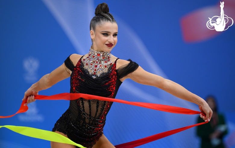 Milena Schenyatskaya during an exercise with a ribbon