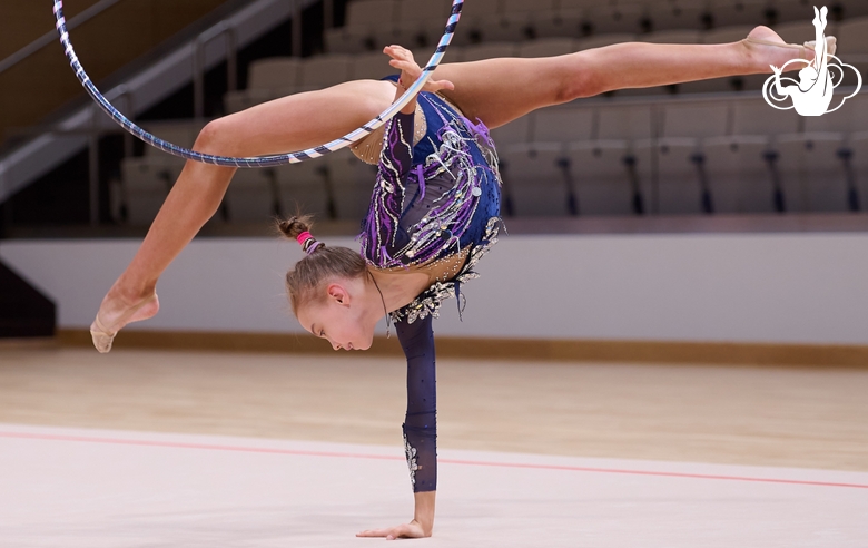 Elvira Belyaeva during an exercise with a hoop at the control training session