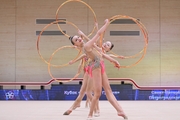 Gymnasts during an exercise with hoops