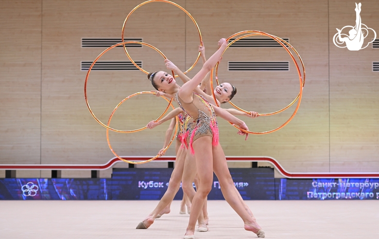 Gymnasts during an exercise with hoops