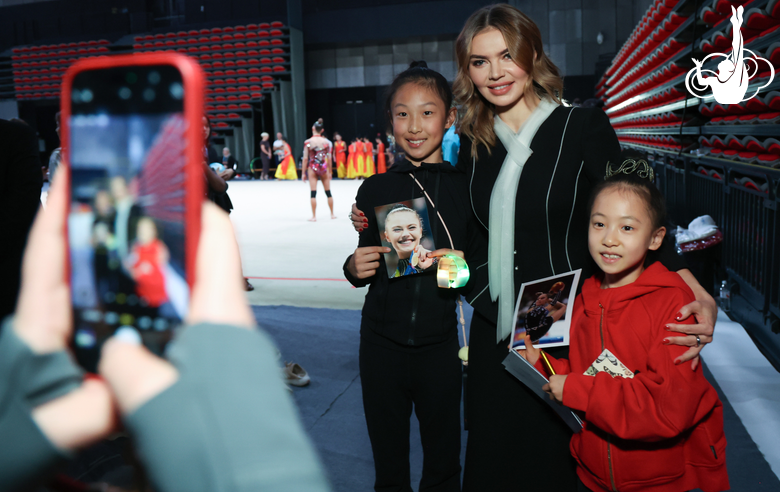 Olympic champion Alina Kabaeva and young fans