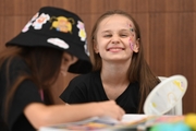 Academy student Yana Zaikina in the face painting area