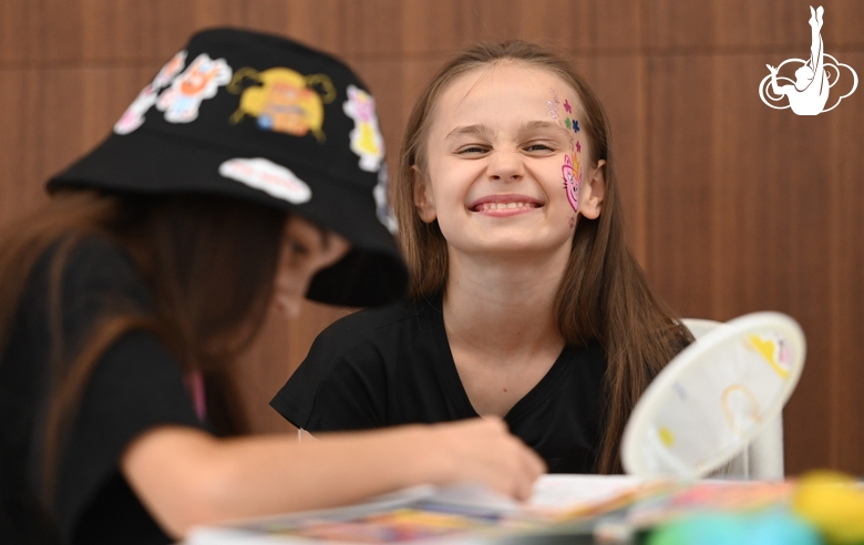 Academy student Yana Zaikina in the face painting area