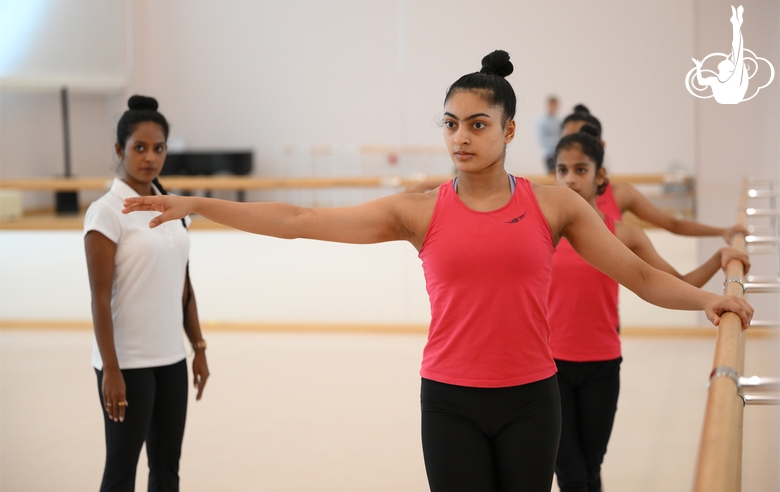 Coach Pooja Surve and gymnasts during choreography