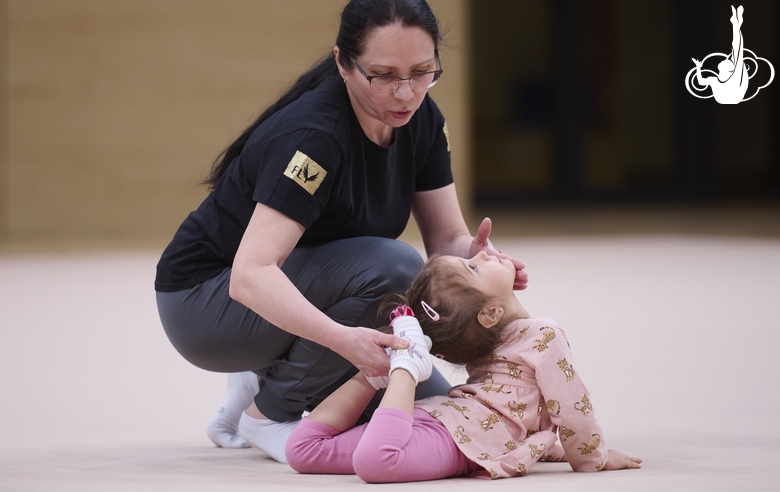 Academy Coach Alla Mishenina with a young gymnast during the selection