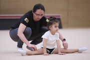 Academy Coach Alla Mishenina with a young gymnast during the selection