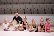 Academy coach Elizaveta Chernova with young gymnasts during the selection