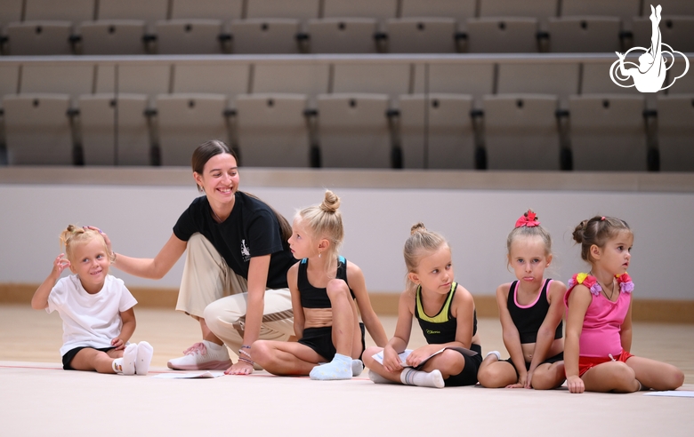 Academy coach Elizaveta Chernova with young gymnasts during the selection