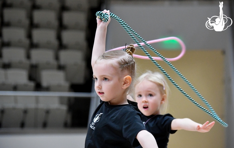 Young gymnasts during training