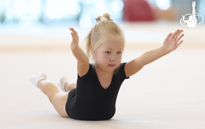 Young gymnast during training