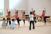 Coach Pooja Surve, gymnasts and Academy choreographer Ekaterina Belova during choreography