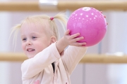 Young gymnasts during training