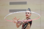 Gymnast during an exercise with a hoop