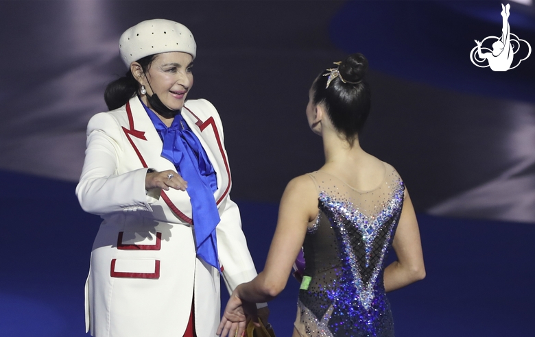 Lala Kramarenko (Russia) after her performance with a ball and Irina Viner