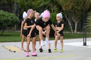 Young gymnasts during outdoor training