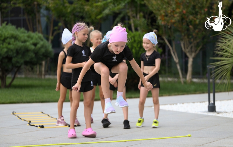 Young gymnasts during outdoor training