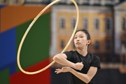 Gymnast perform exercises with a hoop during floor testing before the BRICS Games